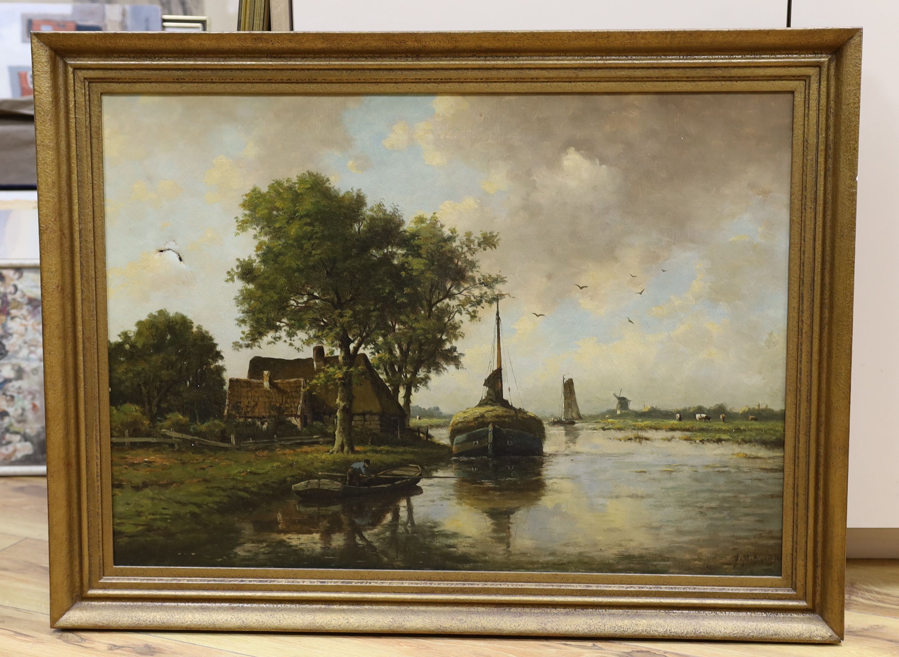 Adriaan Marinus Geijp (1855-1926), oil on canvas, Dutch river landscape with hay barge and windmill, signed, 49 x 69cm (canvas torn)